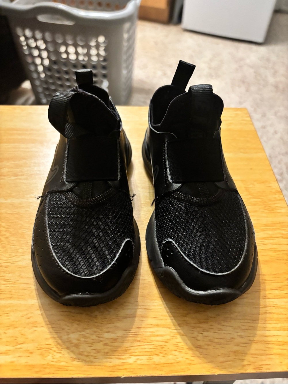 black Nike Flex Runner slip-on sneakers with elastic straps for kids